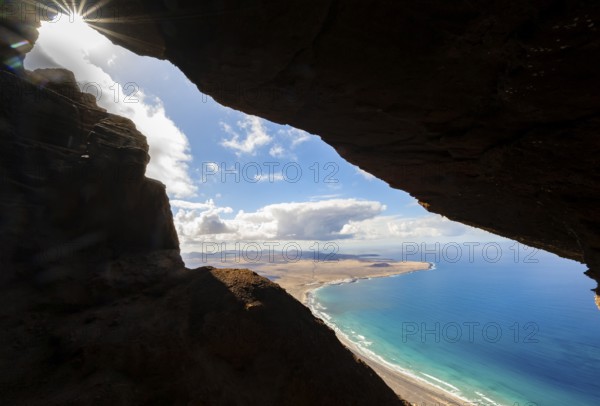Cueva de las Cabras cave, view from the Risco de Famara cliffs to Famara beach, Playa de Famara