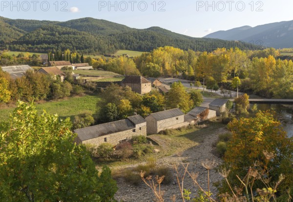 Farm buildings barns autumn landscape village of Echo or Hecho, Valle de Hecho, Huesca province,