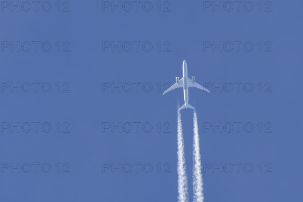 Boeing 787-9 Dreamliner jet passenger aircraft of Gulf Air airlines flying in a blue sky with