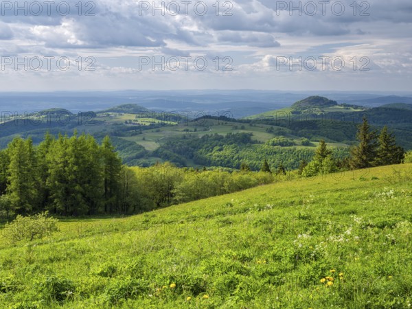 View from the summit of the Wasserkuppe over the hills of the Rhön to Milseburg, Gersfeld, Hesse,