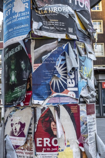 Advertising column for cultural projects, advertising for events, unkempt, torn and exfoliated