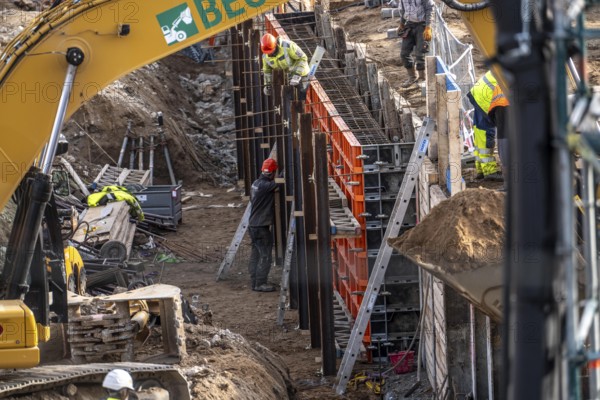 Construction site, dismantling, demolition of a large building, construction of retaining walls in