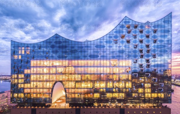 Aerial view of the Elbe Philharmonic Hall with reflections on the façade in the evening light above