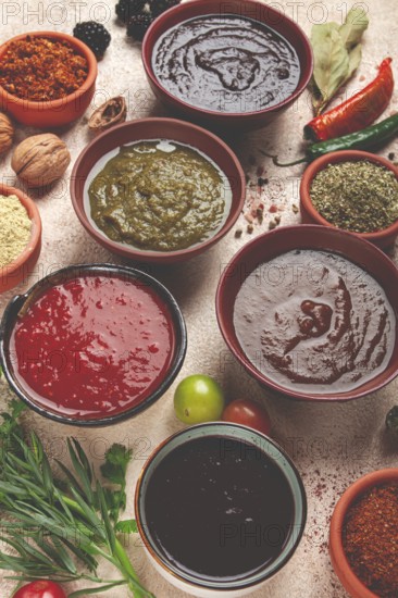 Assortment of Georgian sauces and spices, top view, set of spices and tkemali, Georgian, food