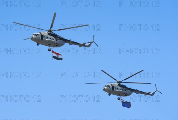 Indian Air Force aerobatic team performs during rehearsals ahead of the air show organised as part
