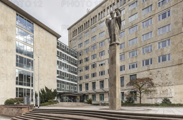 Stuttgart Regional Court. Court building with sculpture Constitutional Column and memorial for