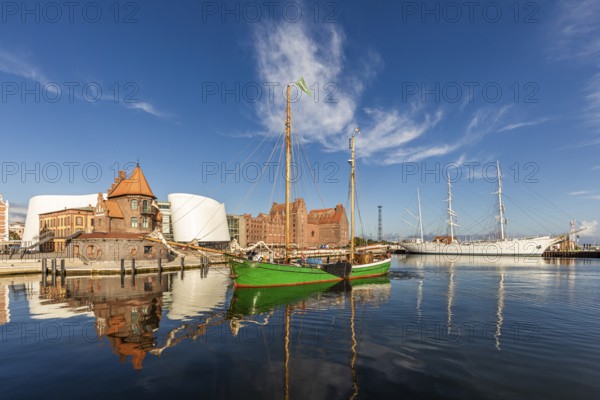 Sailing ship Petrine, a traditional sailor off Pilot House, Ozeanum and Gorch Fock I in the port of