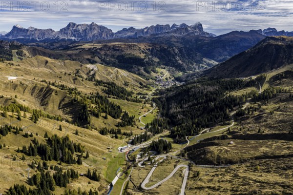 Road, curves, serpentines, pass road, autumn, sunny, Pordoi Pass, view of Tofana Group, Dolomites,