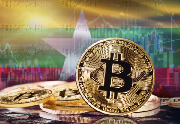 Bitcoin with Myanmar flag in the background. Investors in cryptocurrency and Blockchain Technology
