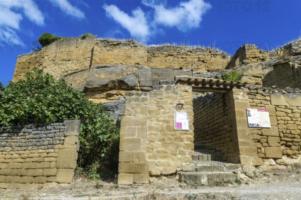 Castle walls built on rock outcrop, medieval village of Uncastillo, Cinco Villas, Zaragoza