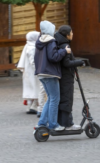 City center, shopping street, Kettwiger Straße pedestrian zone in Essen, 2 young woman on an