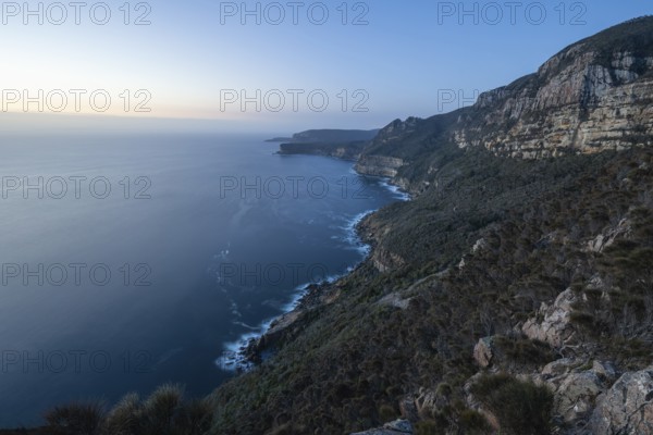Shipstern Bluff viewpoint. Blue hour with long exposure showing sunset over the cliffs of Cape