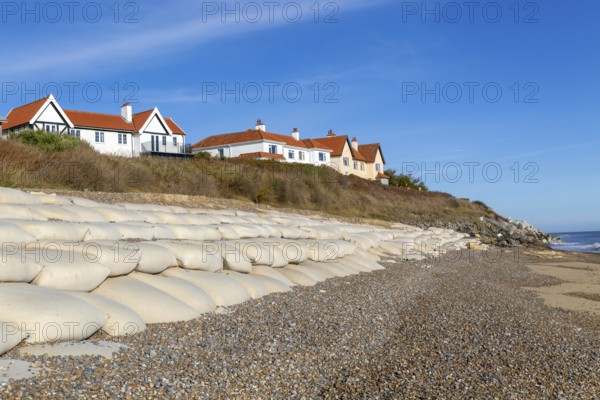 Clifftop houses at risk from coastal erosion, Thorpeness, Suffolk, North Sea coast, England, UK