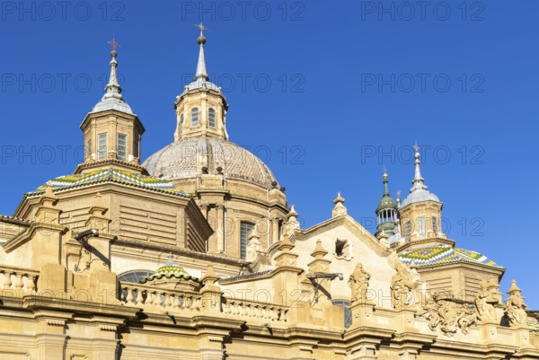 Towers and domes on roof of Basilica of Our Lady of the Pillar cathedral church, Zaragoza, Aragon,