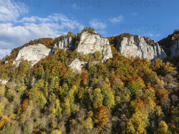 Aerial view of the Upper Danube Valley surrounded by autumn vegetation with the Hausender Peaks