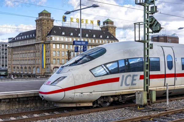 ICE train on track 2 in Essen main station, view of the city center, Handelshof building with Essen