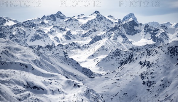 Mountain panorama with view of peaks of the Bernina Group, view from Piz Grialetsch in winter,