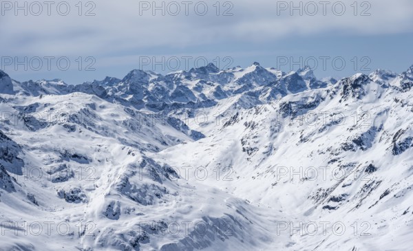 View of mountain panorama with mountain peaks of the Bernina Group, mountain landscape in winter,
