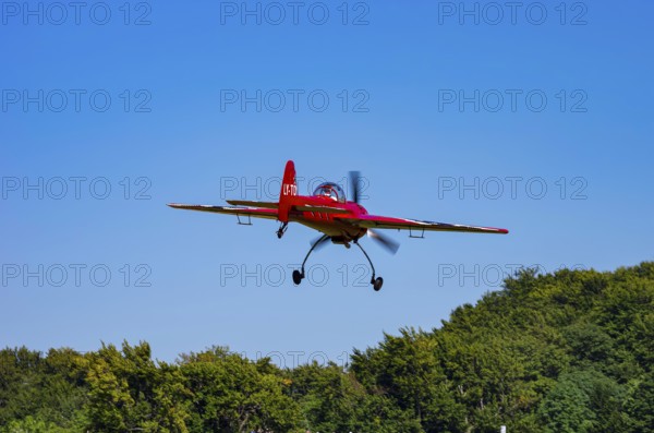 A Soviet Jakovlev Jak-55 sport aircraft with the registration LY-TOY during a flight demonstration