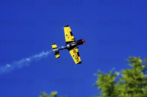 A Votec 351 sport aircraft from the Swiss MSW Aviation AG with registration HB-YMV during a flight