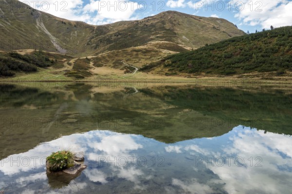 Schlappoldkopf and Söllerkopf are reflected in Schlappoldsee, Fellhorn, Oberstdorf, Oberallgäu,