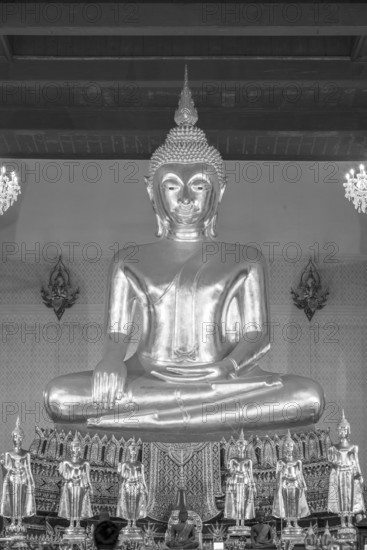 Buddha statue with Bhumispara mudra, Buddha Gautama at the moment of enlightenment, in front of it