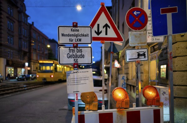 Sign forest, several traffic signs, construction site, stopping ban, dead end, oncoming traffic,