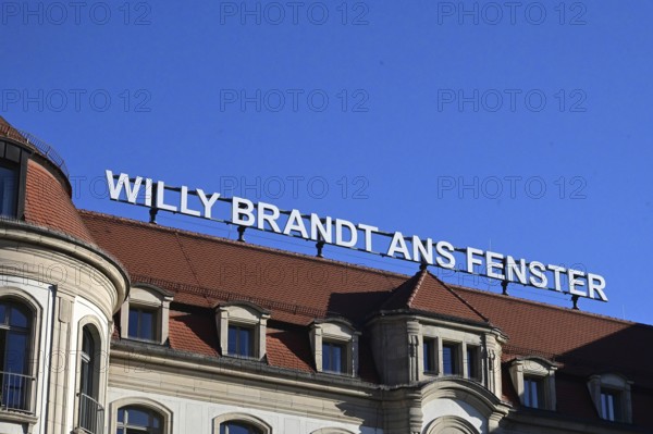 Willy Brandt lettering on the window at the hotel where Brandt visited during GDR times and showed