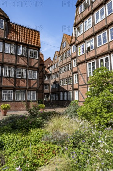 Facades of the historic brick buildings, inner courtyard, view over the city, Peterstraße,