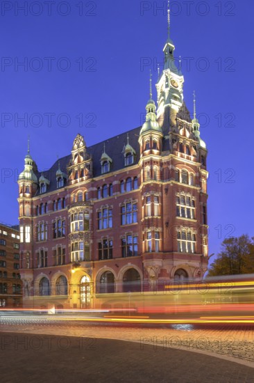 Speicherstadt town hall in Hamburg's Speicherstadt warehouse district at blue hour with traces of