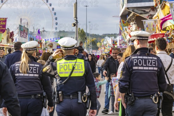 Police patrols at the funfair. The 178th Cannstatter Volksfest on the Wasen attracted 4.2 million