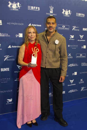 Anneke Kim Sarnau and Michael Klammer present the award for Haley Louise Jones as best actress in a