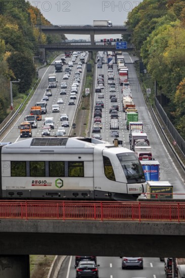 S-Bahn S28 crosses the A3 motorway between the Hilden junction and the Mettmann junction, view to