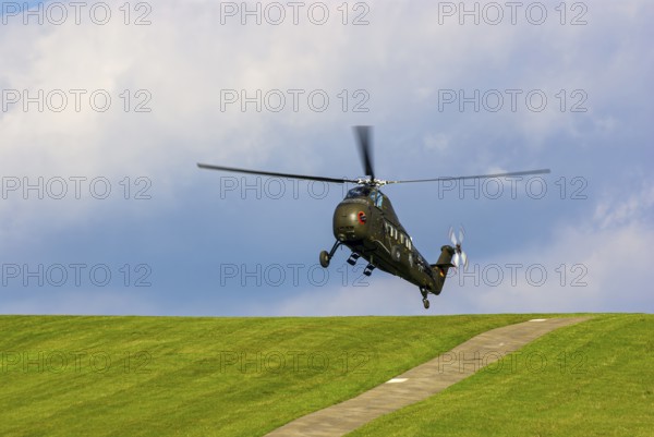 A Sikorsky S-58C transport helicopter in the colours of the German Army with the registration