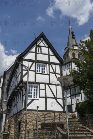 Narrow half-timbered house and church on the market square in the old town, Kettwig, Essen, Rur