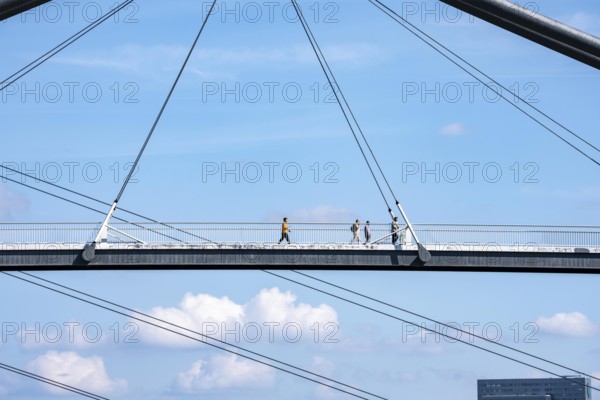 Bridges in Düsseldorf, in the foreground, the pedestrian and cycle bridge over the canal to the