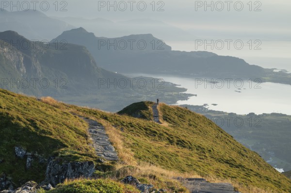 Hikers on Rørsethornet stone staircase, with 3292 steps one of the longest continuous stone