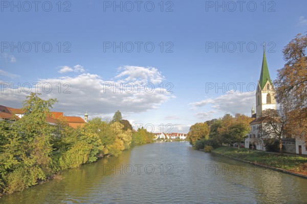 Collegiate church of St. Moriz built 14th century on the Neckar in autumn, Neckar riverbank,