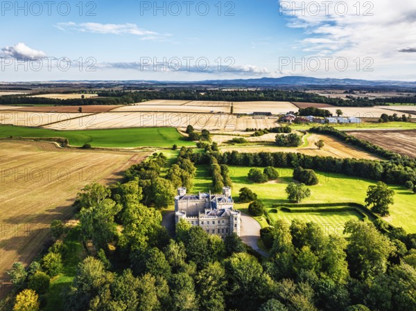 Wedderburn Castle and Barns over fields from a drone, Duns, Berwickshire, Scotland, UK