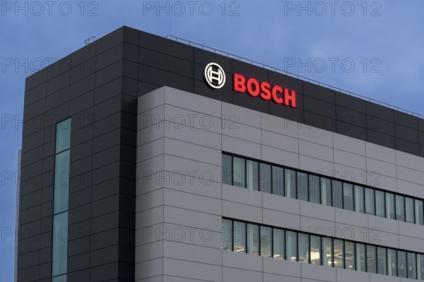 Building with Bosch logo in the evening sky, grey-blue architecture with windows, Waiblingen,