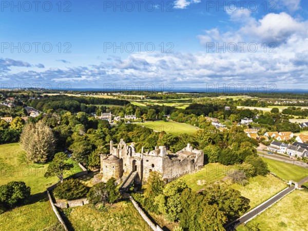 Ruins of Dirleton Castle & Gardens from a drone, Dirleton, East Lothian, Scotland, UK