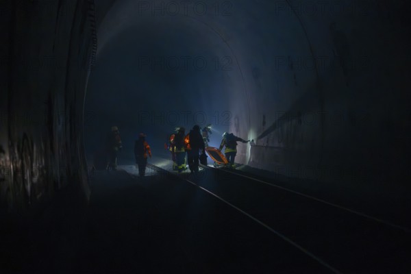 Fire brigade operation in a dark tunnel in dim light, fire brigade exercise in the new construction