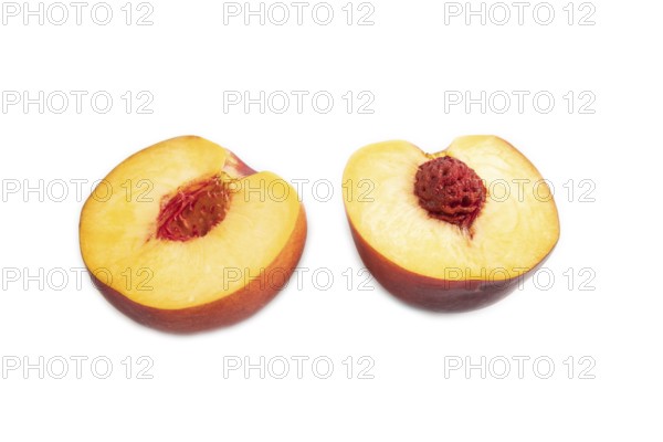 Peach Cut in half isolated on white background. Side view, flat lay, close up. healthy food,