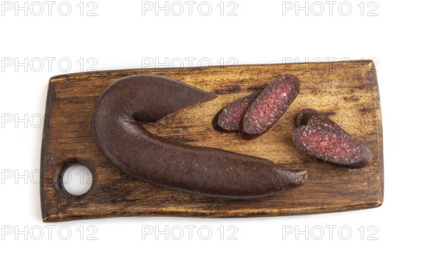 Sujuk sausage isolated on wooden cutting board on white background. Top view, flat lay, copy space