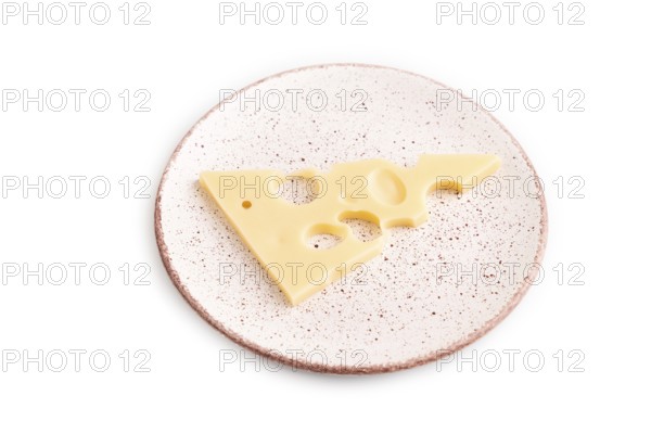 Piece of cheese with holes on plate isolated on white background, side view, copy space, minimalism