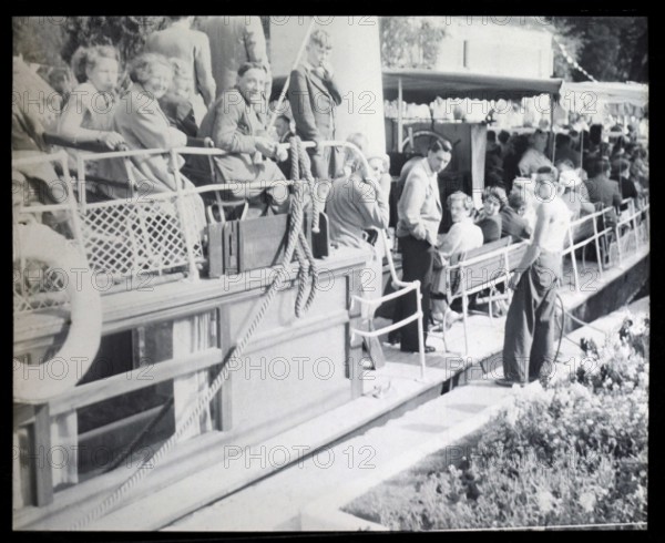 People sitting aboard River Thames steam packet ferry boat either SL Streatley or SS Nuneham,