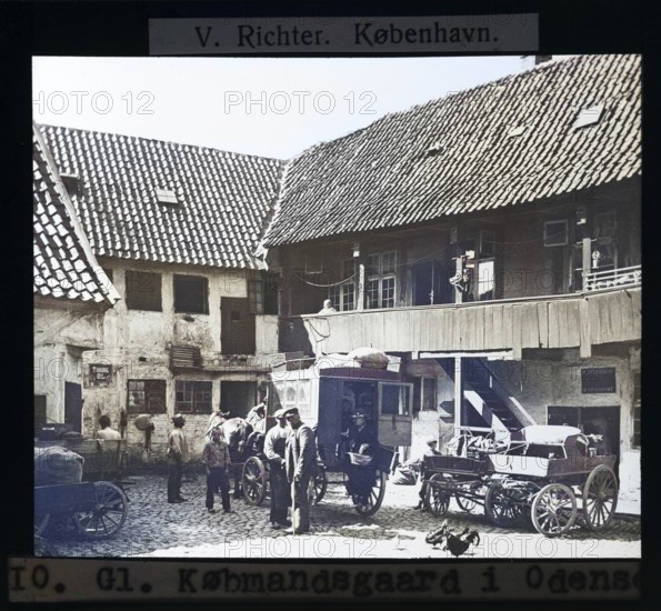 Colourised version Købmandsgaard, horse and carriage in merchant's yard, Odense, Denmark c 1900 by