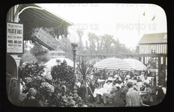 People enjoying pleasure gardens at the Karsino of Fred Karno, Tagg's Island, Molesley, London,