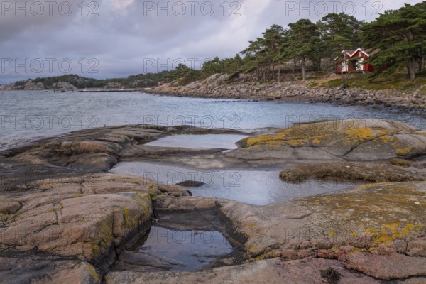 Falun red or Swedish red boathouses, Bohus granite, Resö island, Bohuslän, Skagerrak, Sotenäs,