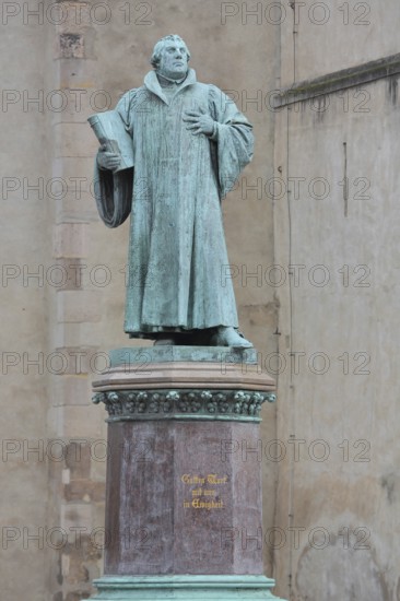 Luther monument, Martin Luther with Bible, sculpture, verdigris inscription, monument, Magdeburg,